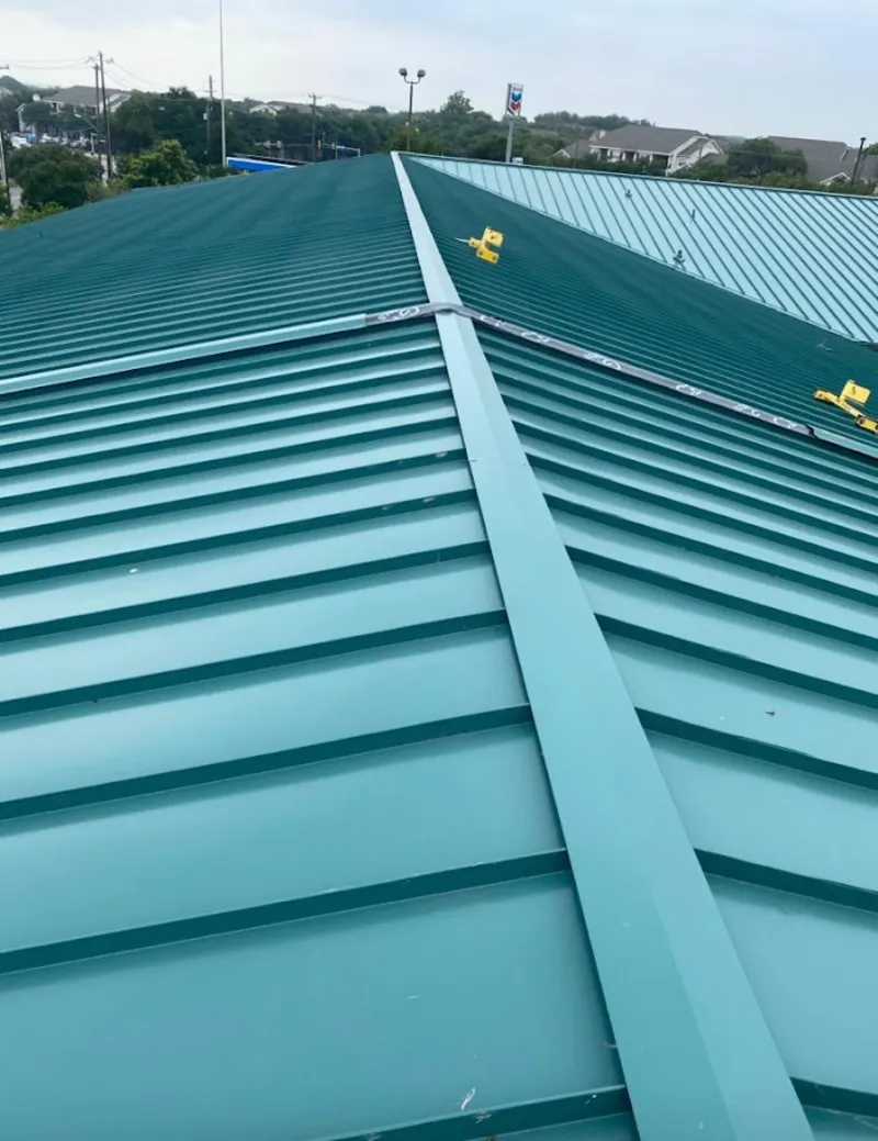 Green commercial metal roof ridge and valley for Metal Roof Repair in Kuna